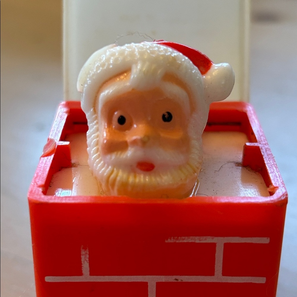 Vintage Pop-Up Squeaky Toy Santa in Chimney